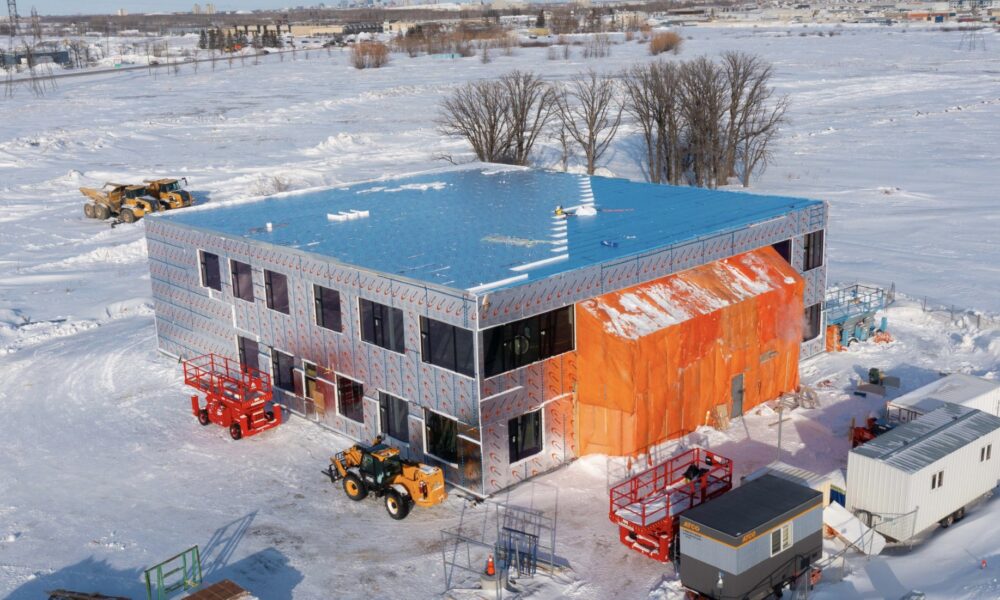 Quiet Workspaces: How Metal Roof Insulation Reduces Noise in Commercial Buildings