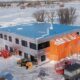 Quiet Workspaces: How Metal Roof Insulation Reduces Noise in Commercial Buildings